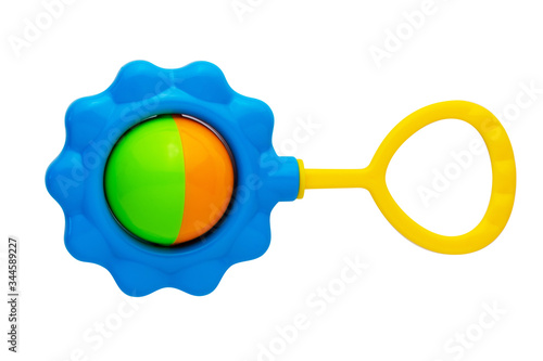 A colorful baby rattle on a white background. Isolate.