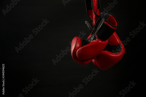 Boxing gloves with black background. © DaniRodri