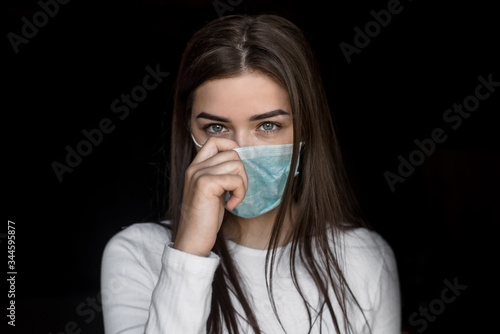 portrait of a girl in a medical mask