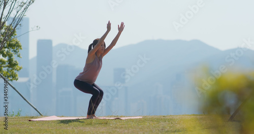 Photography Woman do yoga at outdoor city