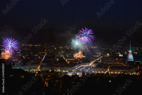 Panoramic view of Turin with fireworks at the feast of San Giovanni