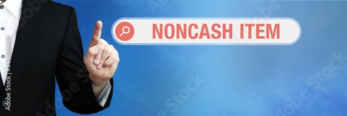 Noncash Item. Lawyer in suit points with his finger to a search box. The term Noncash Item is in focus. Concept for law, justice, jurisprudence photo