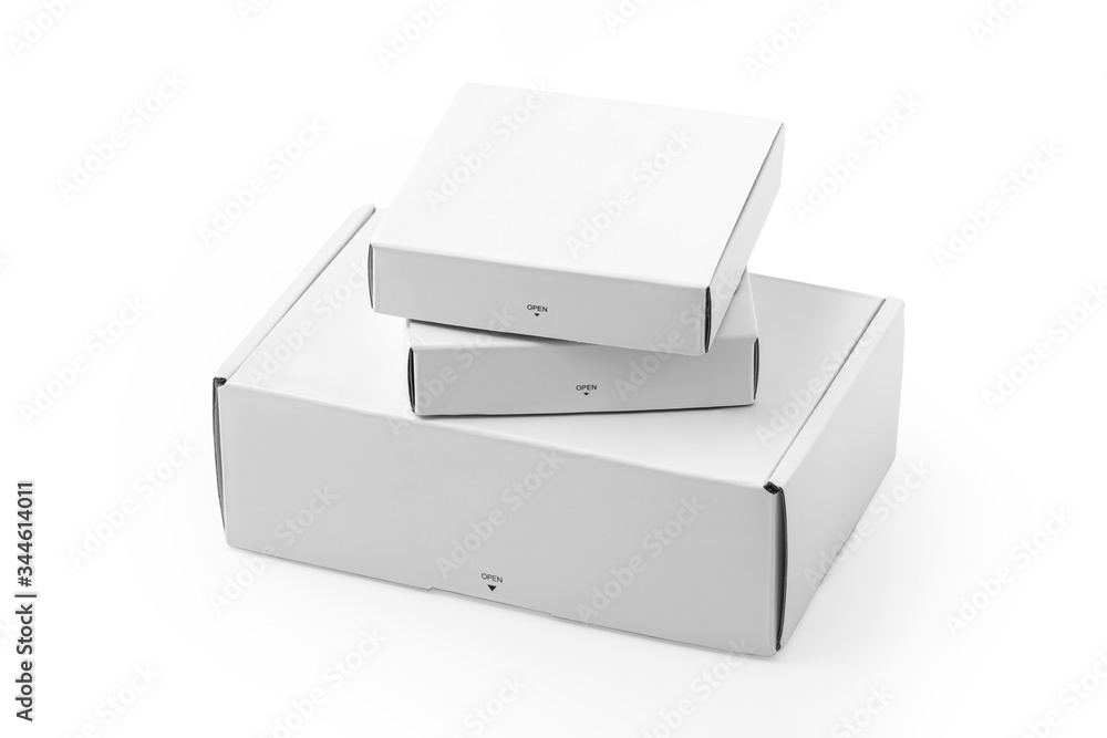 Closed white packaging boxes with different size isolated on white background