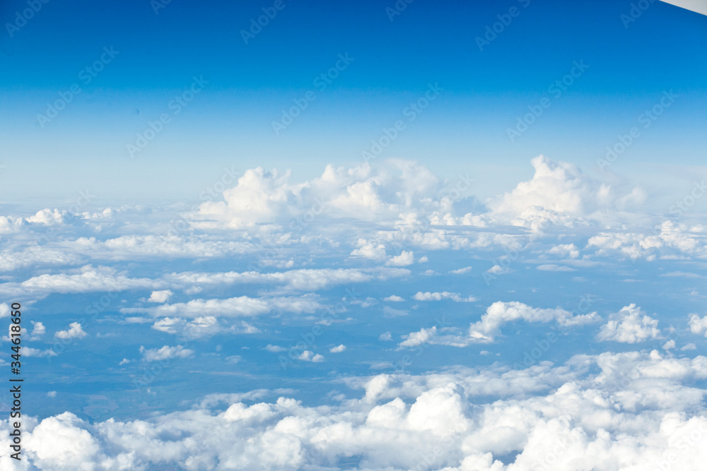 Clouds top view of the airplane. Heavenly landscape. Clouds top view of the airplane. Heavenly landscape.