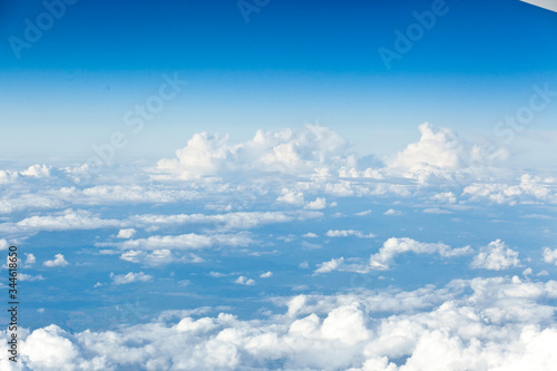Clouds top view of the airplane. Heavenly landscape.