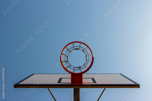 Basketball ring with a blue sky. Selective focus.  Copy Space. 