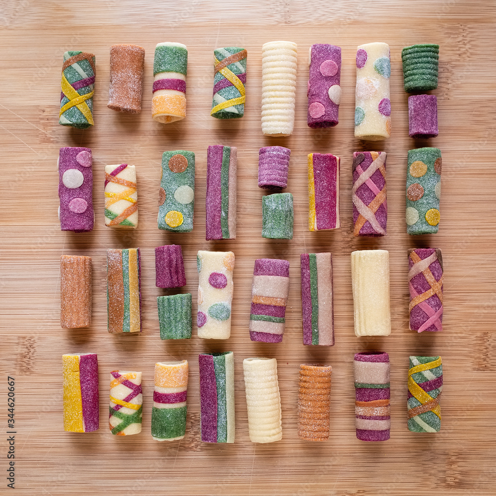 Colourful macaroni homemade with vegetables and spices arranged as an array. Handmade in Puglia, Italy