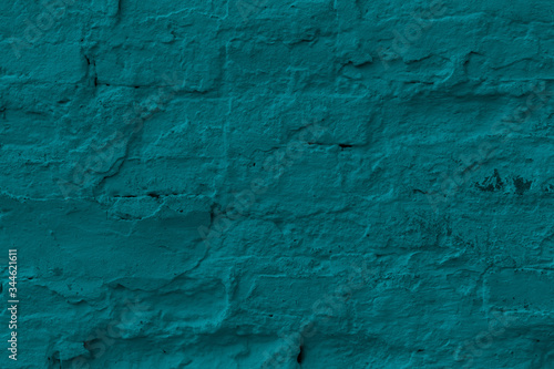 Green plastered brick wall texture.