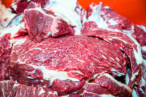 Harvesting cow meat in a meat factory