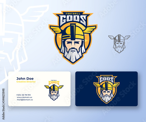 Football Gods Sport Team or League Abstract Vector Logo and Business Card Template. Odin Face with Typography. Mighty Warrior Head in a Helmet Mascot. Premium Stationary Realistic Mock Up.