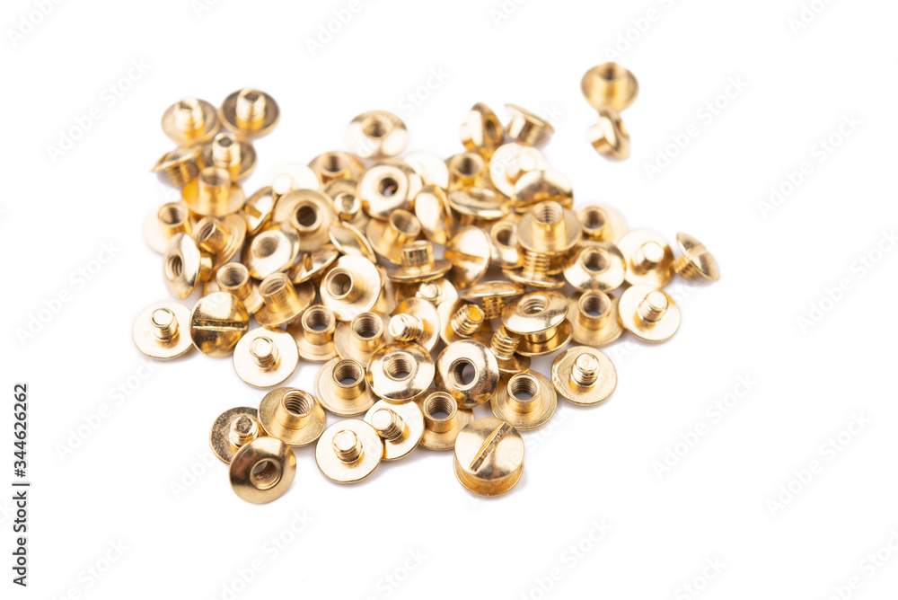 Close-up of a brass screw rivet, for electronics, construction, engineering, Golden metal on a white background. Close-up of a brass screw rivet, for electronics, construction, engineering, Golden metal on a white background.