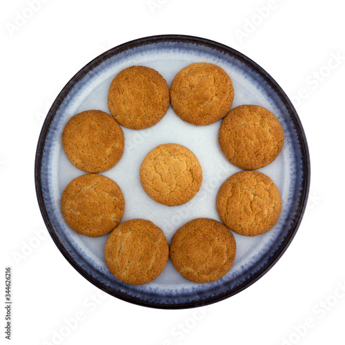 Group of coconut flavor cookies arranged on a blue plate