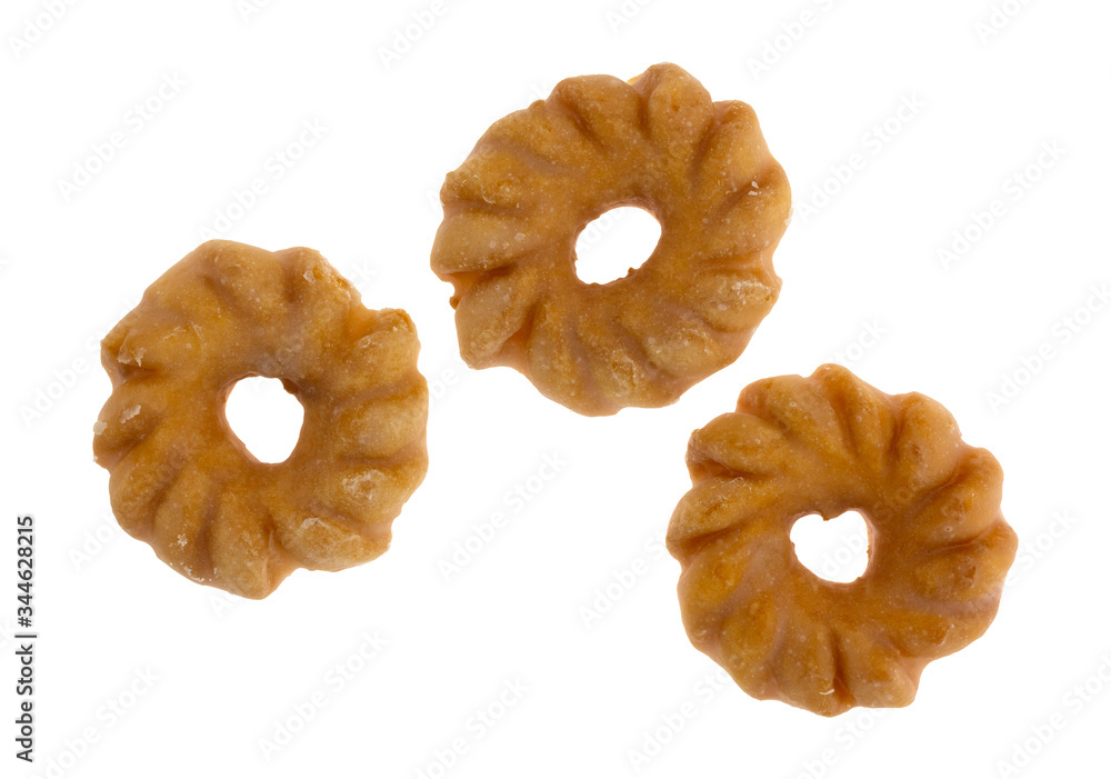 Glazed crullers on a white background