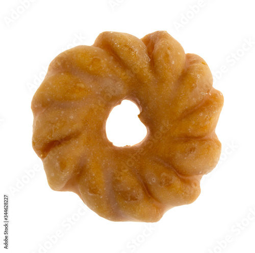 Glazed cruller on a white background