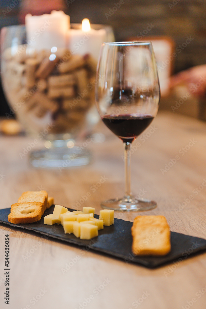 Fototapeta premium Close up on wine glasses in vineyard shop at tasting experience