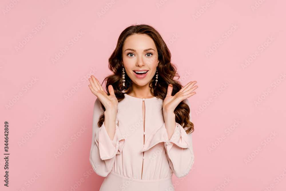 excited girl with opened mouth gesturing isolated on pink excited girl with opened mouth gesturing isolated on pink