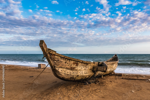 Ghana fishing area with a commissioned boat waiting for the next opportunity to fish. Ada Foah Ghana West Africa 2019 September 21