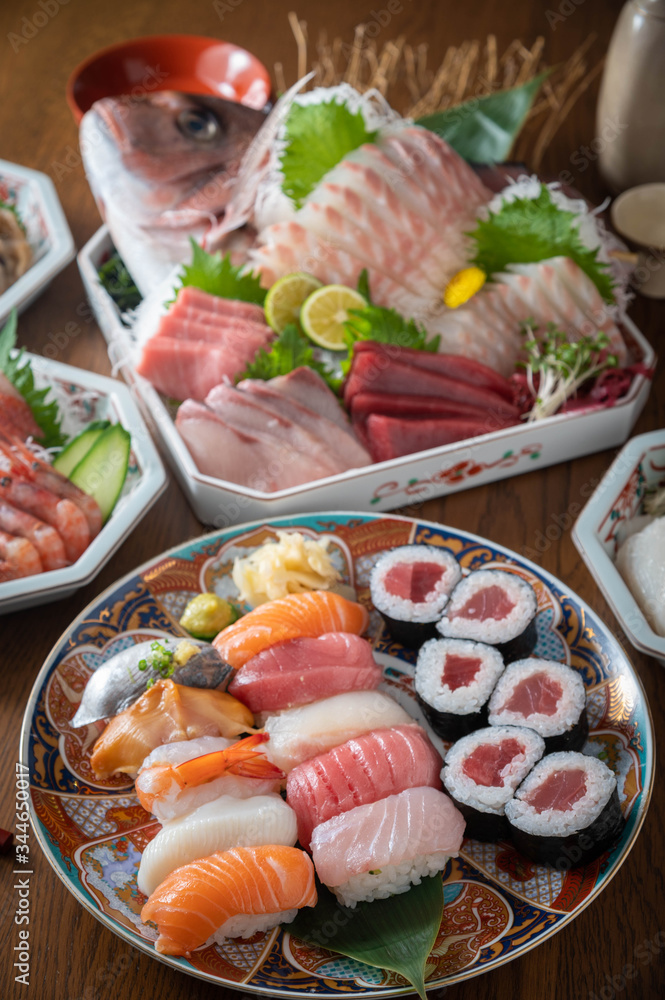 combination of japanese sushi and sashimi platter combination of japanese sushi and sashimi platter