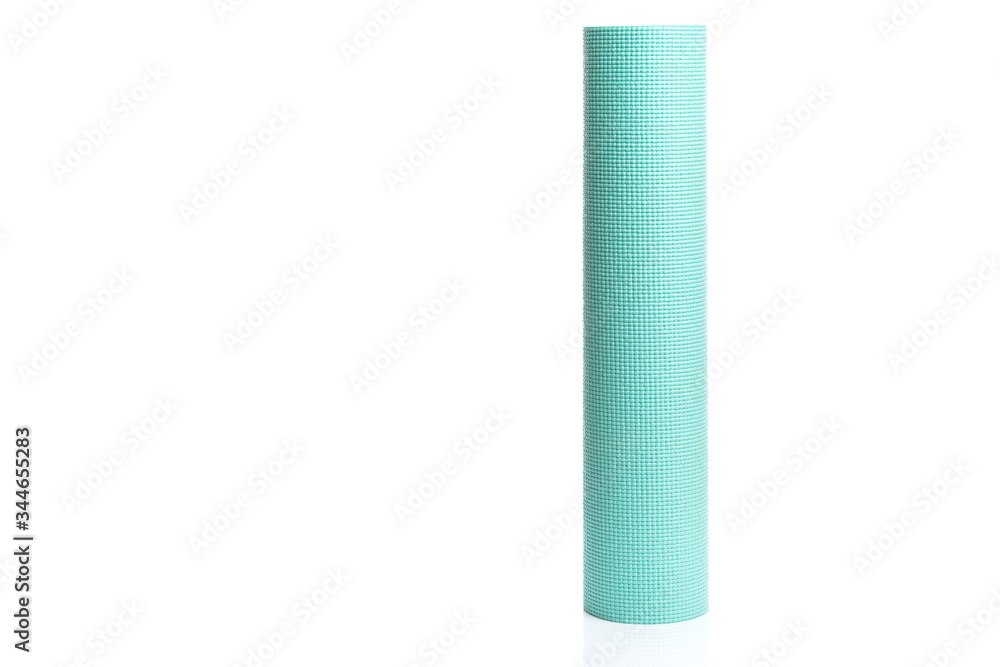 Rolled blue yoga or fitness mat isolated on white background Rolled blue yoga or fitness mat isolated on white background
