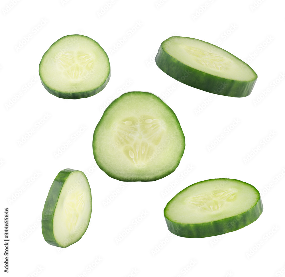 Falling Cucumber Slice Isolated on White Background, Close Up Vegetable in Air Falling Cucumber Slice Isolated on White Background, Close Up Vegetable in Air