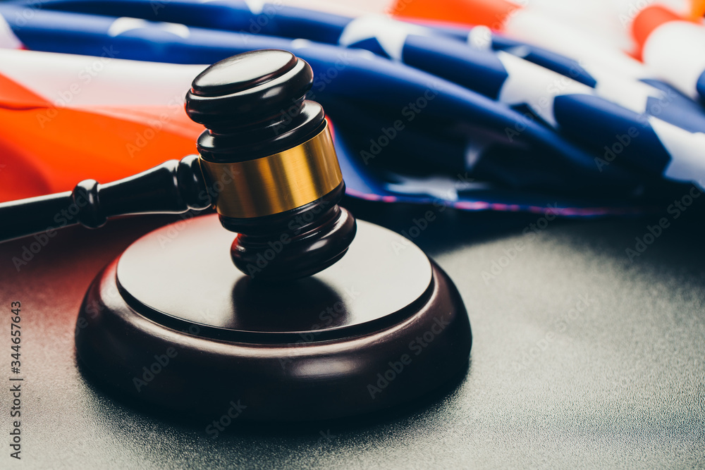 Judge gavel on the background of the flag united states of America Judge gavel on the background of the flag united states of America