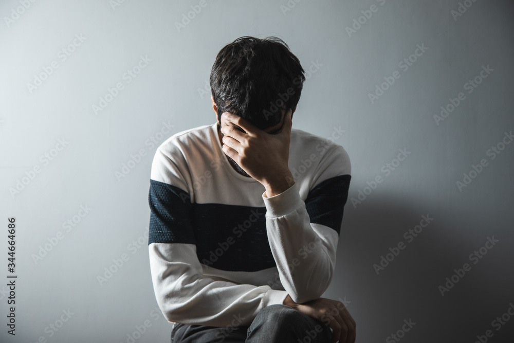sad man hand in face sad man hand in face