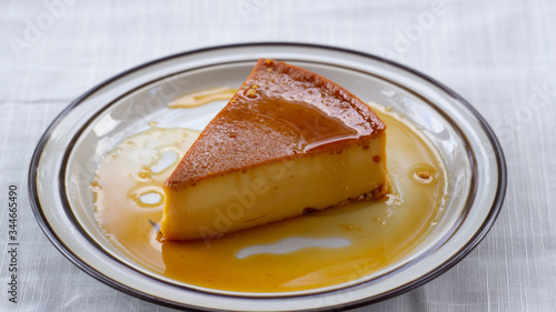 side view of a caramel flan