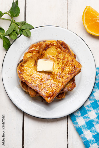 French toast with cinnamon on white background