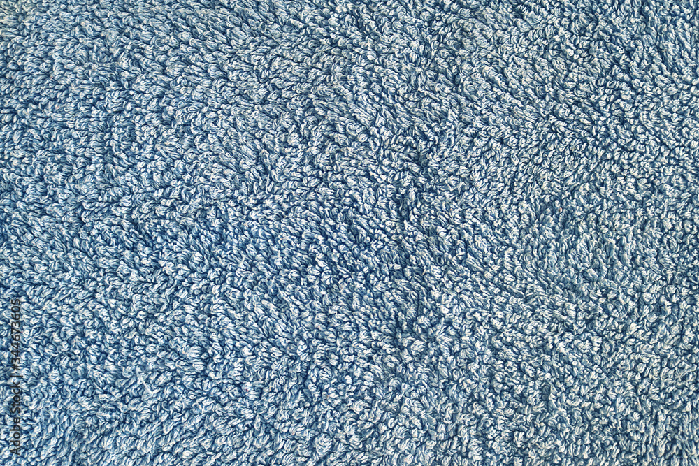 flat blue fabric surface of a soft towel - closeup background texture material flat blue fabric surface of a soft towel - closeup background texture material