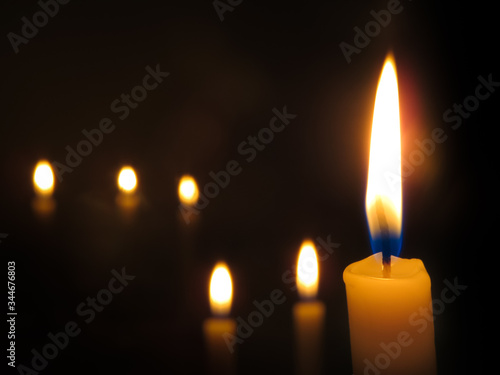 Candles with dark bokeh background