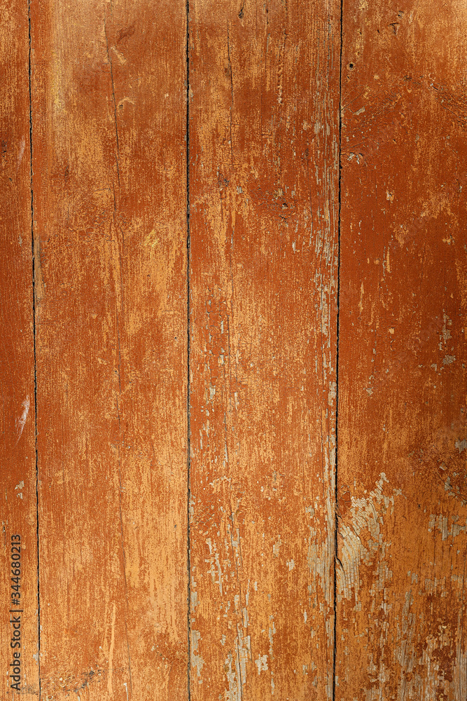 Naklejka premium The texture of the old tree painted in red color, a beautiful background