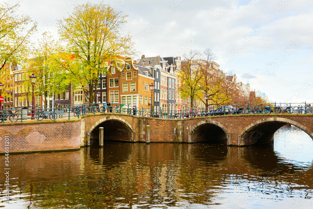 Obraz premium view of a typical canal in Amsterdam, Netherlands