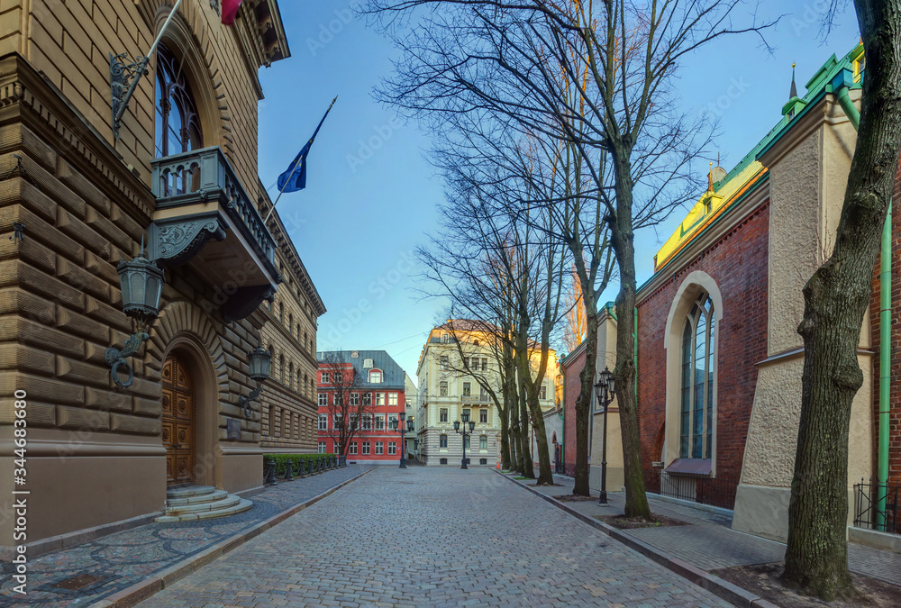 APRIL 23, 2020 - RIGA, LATVIA: Empty streets of Old Town, Latvian parliament building in coronavirus COVID-19 pandemic quarantine time