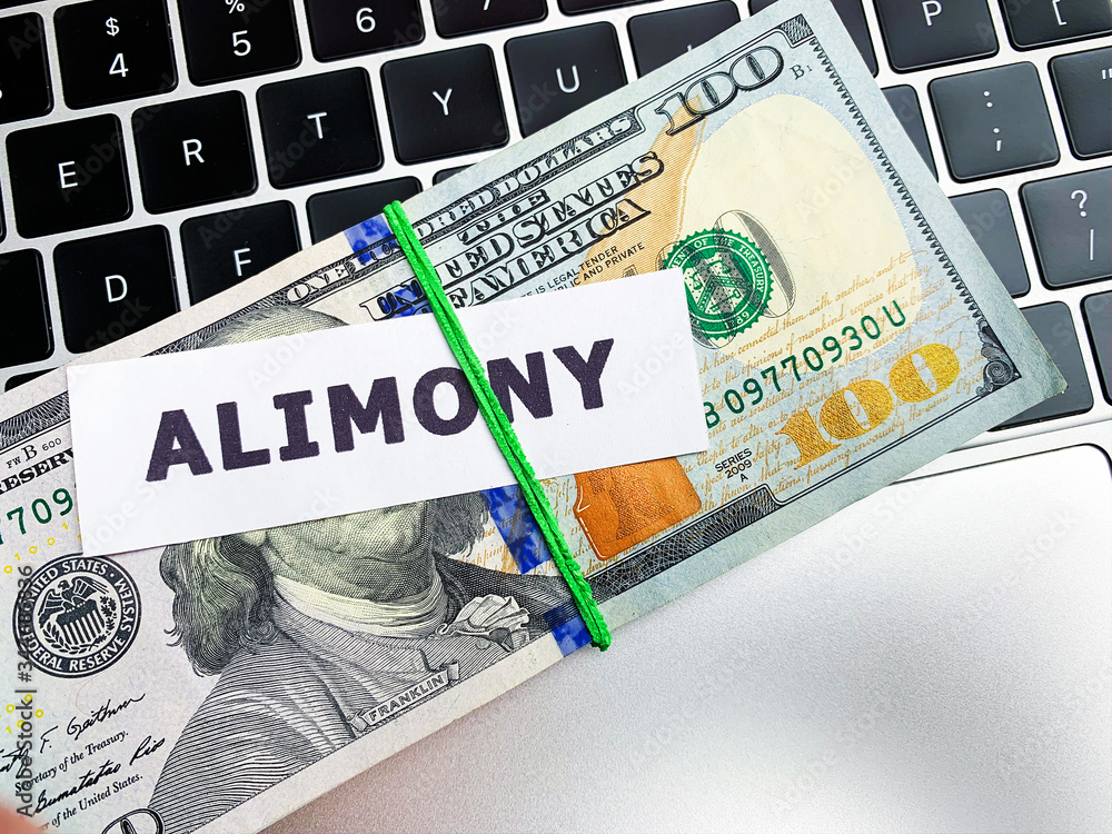 Fototapeta premium Money to pay child care alimony is on the table