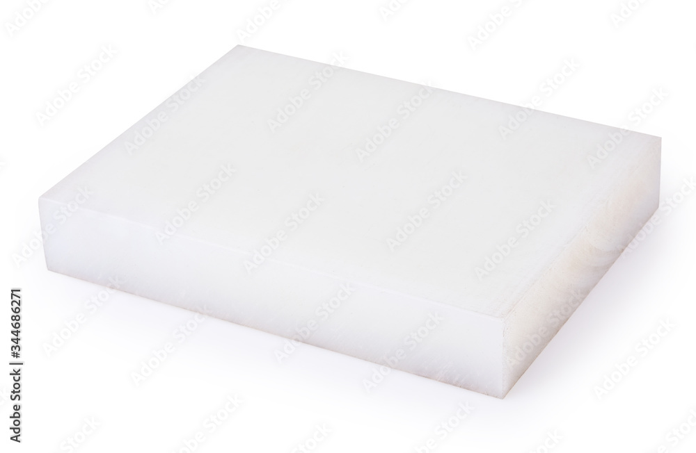 White new polyurethane board for die-cutting isolated on a white background with clipping path. Slab is used as support for the material being cut by mechanical pressing of the die. Craftsmen tools. White new polyurethane board for die-cutting isolated on a white background with clipping path. Slab is used as support for the material being cut by mechanical pressing of the die. Craftsmen tools.
