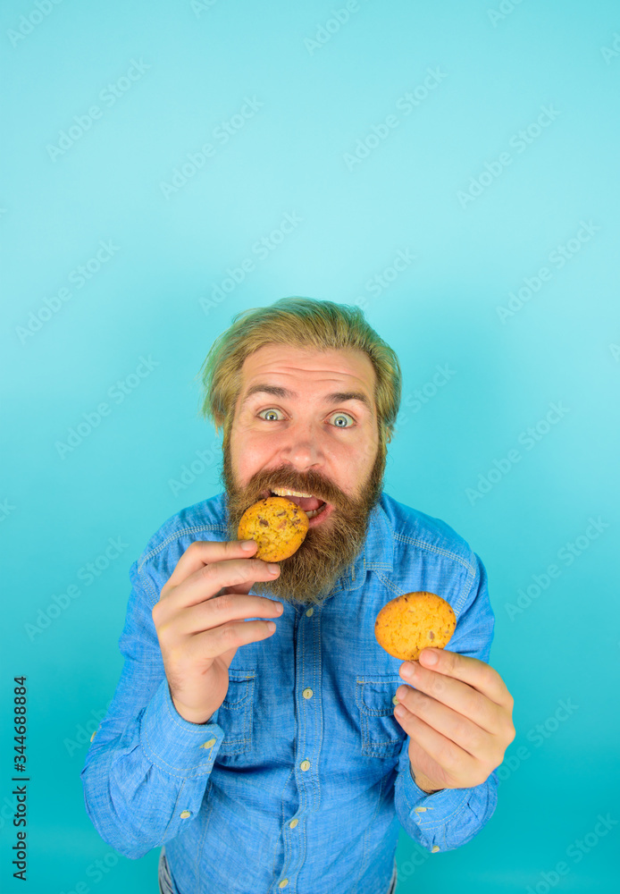 Cookie. Biscuit. Biscuits. Sweet snack. Man eats cookie. Homemade cookies. Taste of childhood. Bearded man with cookies. Breakfast or lunch. Sweet cookies. Bakery. Cookie. Biscuit. Biscuits. Sweet snack. Man eats cookie. Homemade cookies. Taste of childhood. Bearded man with cookies. Breakfast or lunch. Sweet cookies. Bakery.