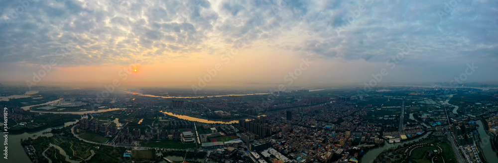 Aerial photo of sunrise scenery of Huayang Lake Wetland Park in Dongguan, China