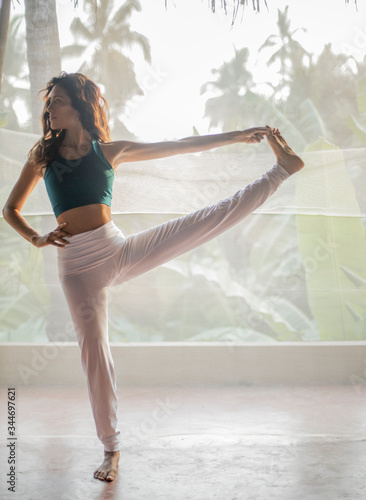 the young woman doing yoga