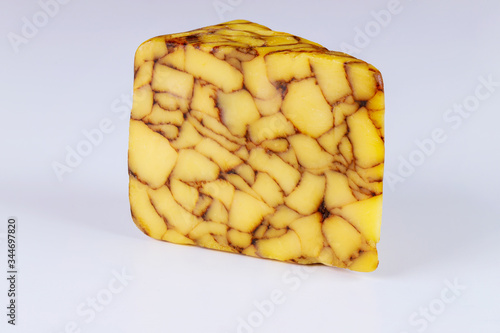 Valokuva Piece of cheddar Irish porter cheese.