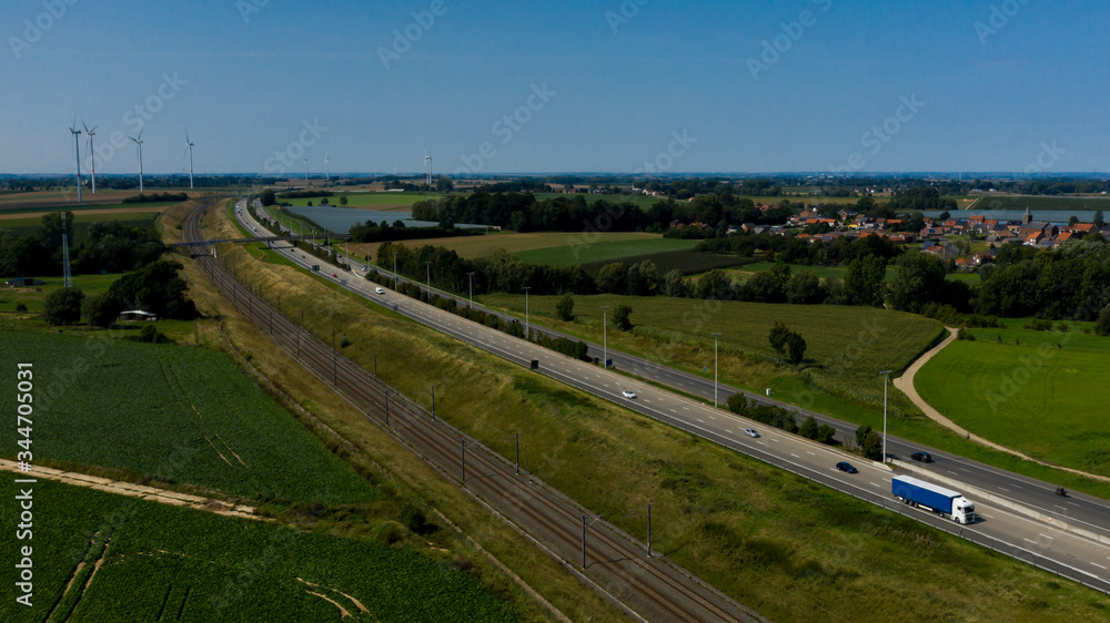 Aerial view of a railway, next to the E40 highway