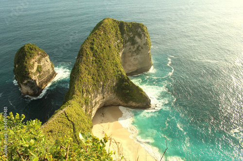 Aerial view Kelingking Beach on Nusa Penida Island, Bali, Indonesia. Kelingking mean pinkie or little finger. photo