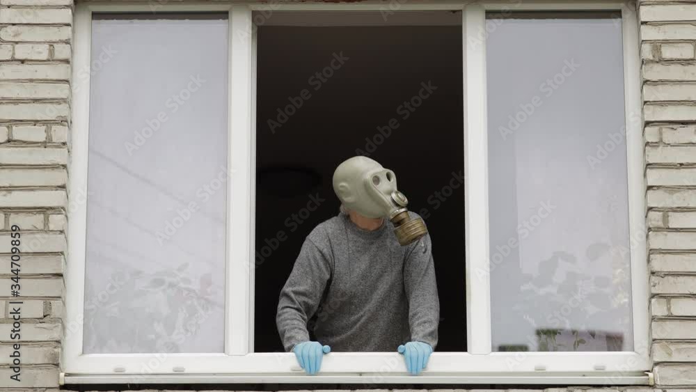 custom made wallpaper toronto digitalOld man in gas mask stay at window isolated at home on quarantine. Coronavirus