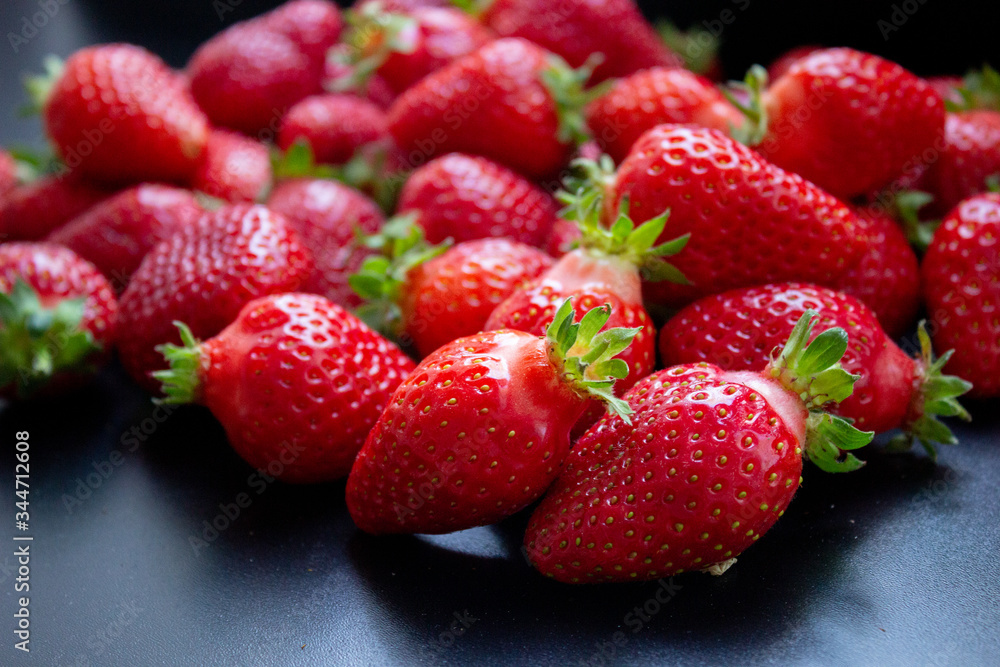 a lot of fresh juicy strawberries a lot of fresh juicy strawberries