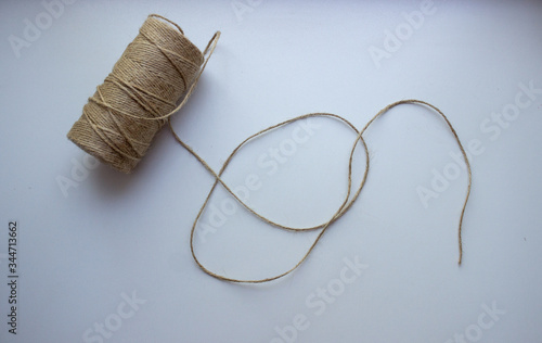 coil of twine on a white background