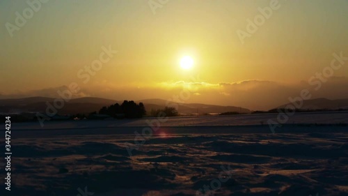 Timelapse of a Sunset over the snow in Hokkaido, in the north of Japan