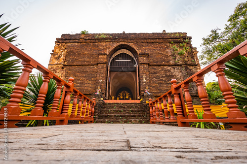 Ancient pagoda in Chet Yod temple photo