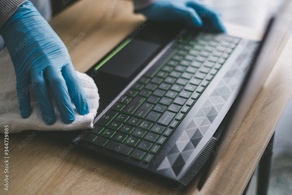 Coronavirus COVID19 sanitize disinfecting laptop pc cleaning