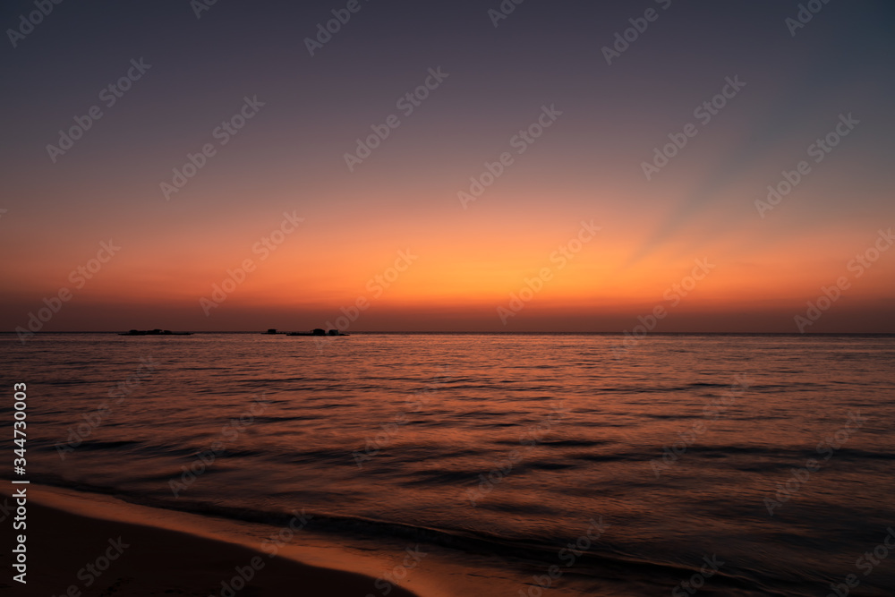 Colorful sunset over ocean and floating village on Phu Quoc