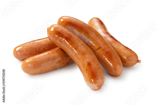 Fotografía Baked sausages placed on a white background