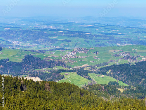 View from the top of the alpine hill Hüenerhubel (Hueenerhubel oder Huenerhubel) over the Eigental valley, Eigenthal - Canton of Lucerne, Switzerland (Kanton Luzern, Schweiz) photo